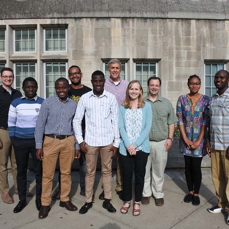 Posing for a group photo in front of Simon Hall are participants and hosts of IU Biology's first summer research program for African students to conduct research at IU to improve competitiveness of their applications to graduate school.