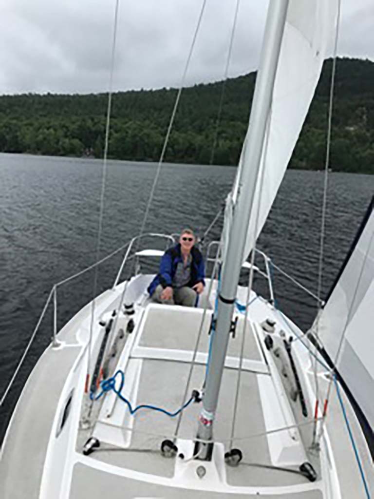 Craig Pikaard on his sailboat--getting some wind therapy.