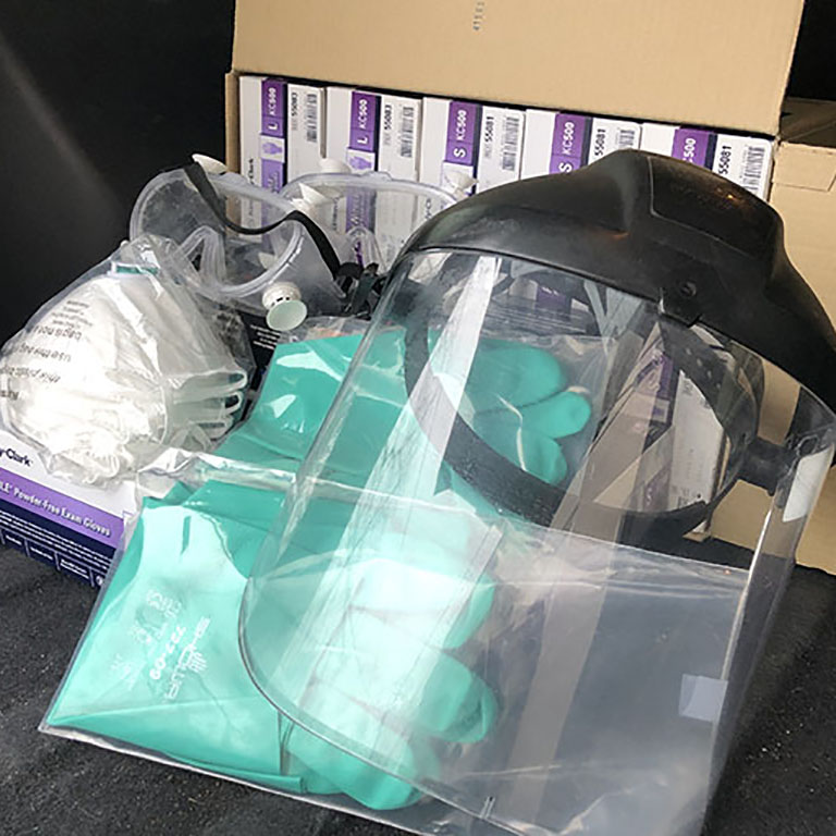 Personal protective equipment for health care workers: masks, gloves, shield.