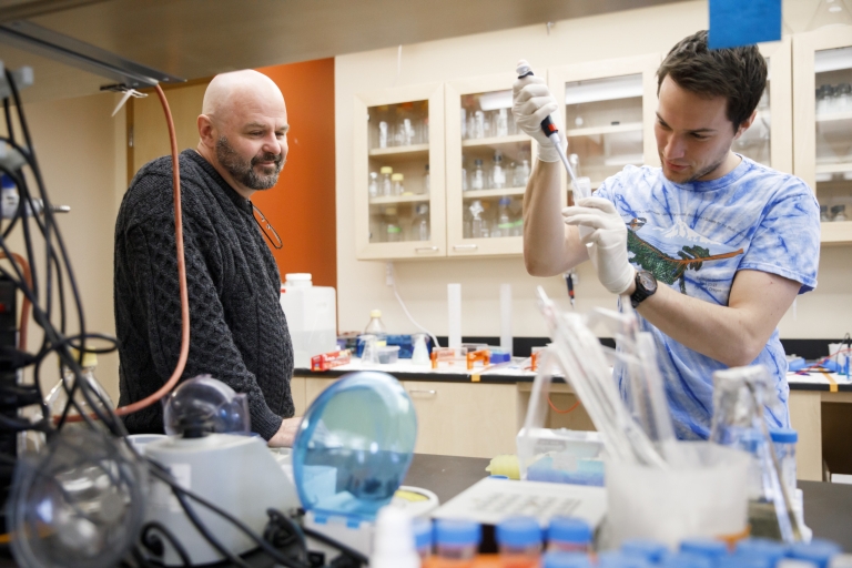 Dan Tracey and Jeremy Davis in the lab.